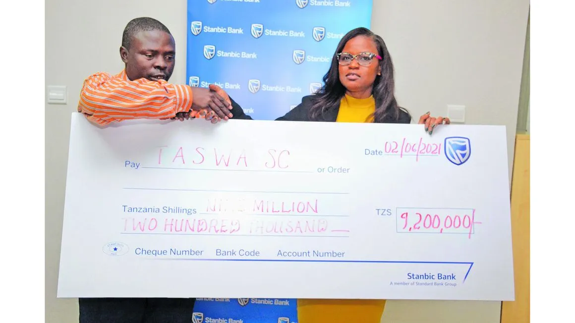 Stanbic Bank Tanzania Desideria Mwegelo with Taswa Chairman