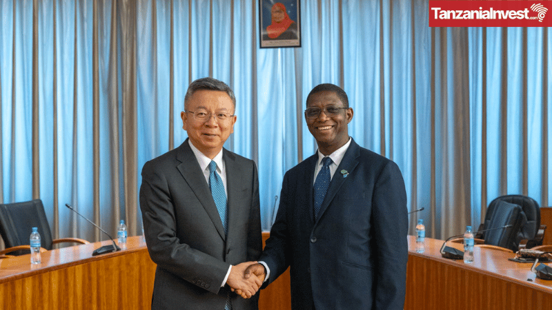 Bo Li of the IMF with Emmanuel Tutuba of BOT
