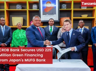 Nsekela of CRDB Bank Tanzania Signing Green Financing with Christopher Marks of Japan MUFG Bank